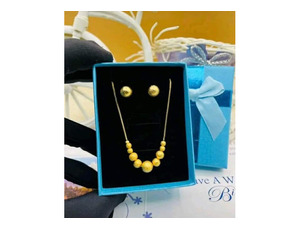 Tiny Golden earrings and necklace